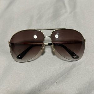 Vintage Y2K juicy couture sunglasses .